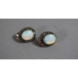 A Pair of Silver, Opal and Marcasite Clip-on Earrings.