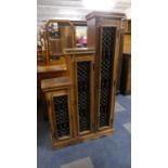 A Stepped Storage Display Cabinet with Ironwork Panels to Doors. Indonesian Hardwood, 75cm x 133cm.