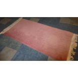 A Vintage Pink Hearth Rug, 175 x 77cms