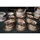 A 1950's Windsor Rose Patterned Tea Set. Six Trios, Teapot, Sugar, Cream and Cake Plate.