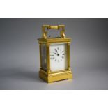 A French Late 19th Century Gilt Brass Cased Musical Carriage Clock with Repeater Movement. Reeded