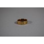 A 9 Carat Gold Gents Wedding Band, Size N. 3.9g.