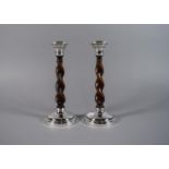 A Pair of Silver Mounted Oak Barley Twist Candlesticks. Birmingham 1930 by Deakin and Harrison. 22cm