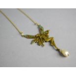 A 14ct Gold Pendant in the Form of an Angel with Coloured Plique a Jour Translucent Wings and