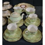 A Part Queen Anne Green & Gilt Tea Set Comprising Three Cups, Sugar, Milk, Six Side Plates, Six