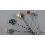 A Collection of Six Vintage Hat Pins to include silver and amber