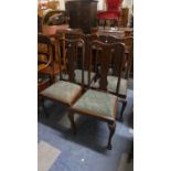 A Set of Four Edwardian Mahogany Queen Anne Style Dining Chairs