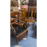 A Set of Three Edwardian Oak Dining Chairs and a Victorian Mahogany Commode Armchair