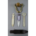 A Pair of Small Brass Nutcrackers, Mother of Pearl Money Clip and Spoon, Miniature Box in the Form
