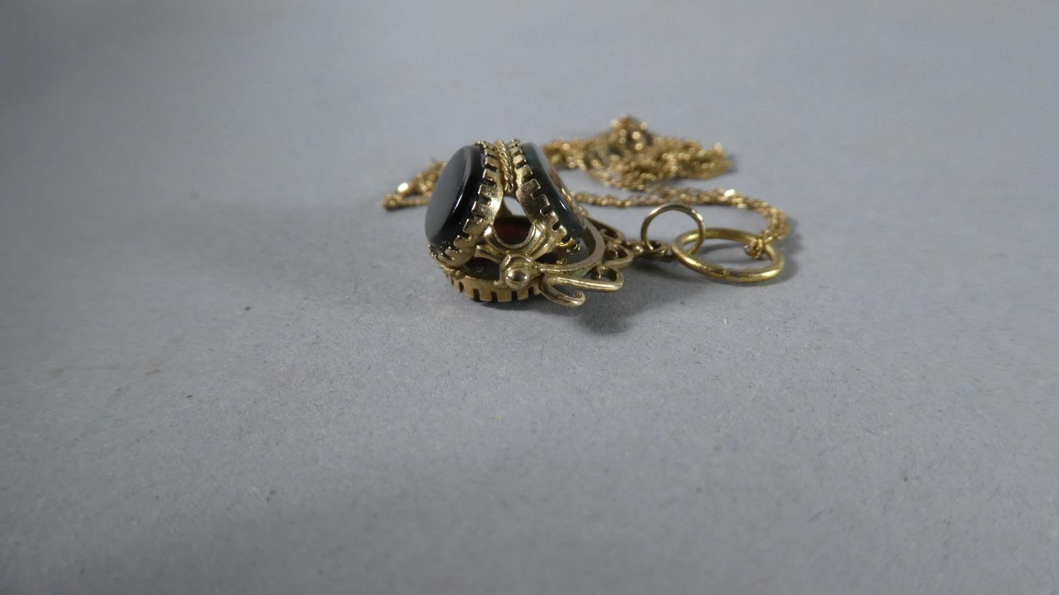 A 9 Carat Gold Chain with Swivel Triple Fob. Total Gross Weight - 3.5gms - Image 2 of 2