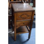 An Edwardian Sewing Stand with Hinged Lid, Central Drawer and Stretcher Shelf, 38cms Wide