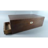 A Mahogany Writing Slope with Secret Side Drawer, Fitted Interior and Two Brass Carrying Handles,