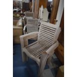 A Set of Eight Wooden Garden or Patio Chairs (One Missing Arm)