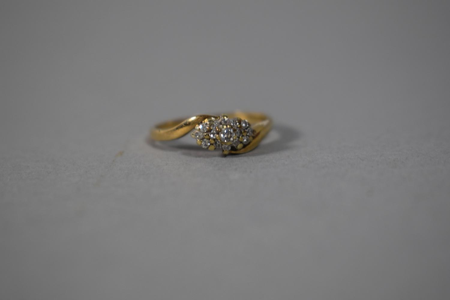 A 9 Carat Gold and Diamond Ring, Size L, 1.9gms