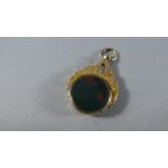 A 9 Carat Gold Fob Set with Bloodstone and Carnelian. Total Gross Weight - 7.3gms