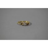 An 18 Carat Diamond & Sapphire Trilogy Ring, Size M, 1.9gms
