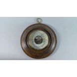 An Edwardian Circular Oak Aneroid Barometer, 19.5cms Diameter