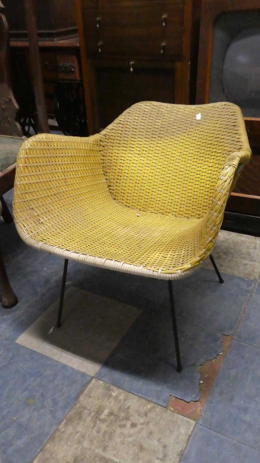 A Retro Woven Tub Chair on Metal Frame