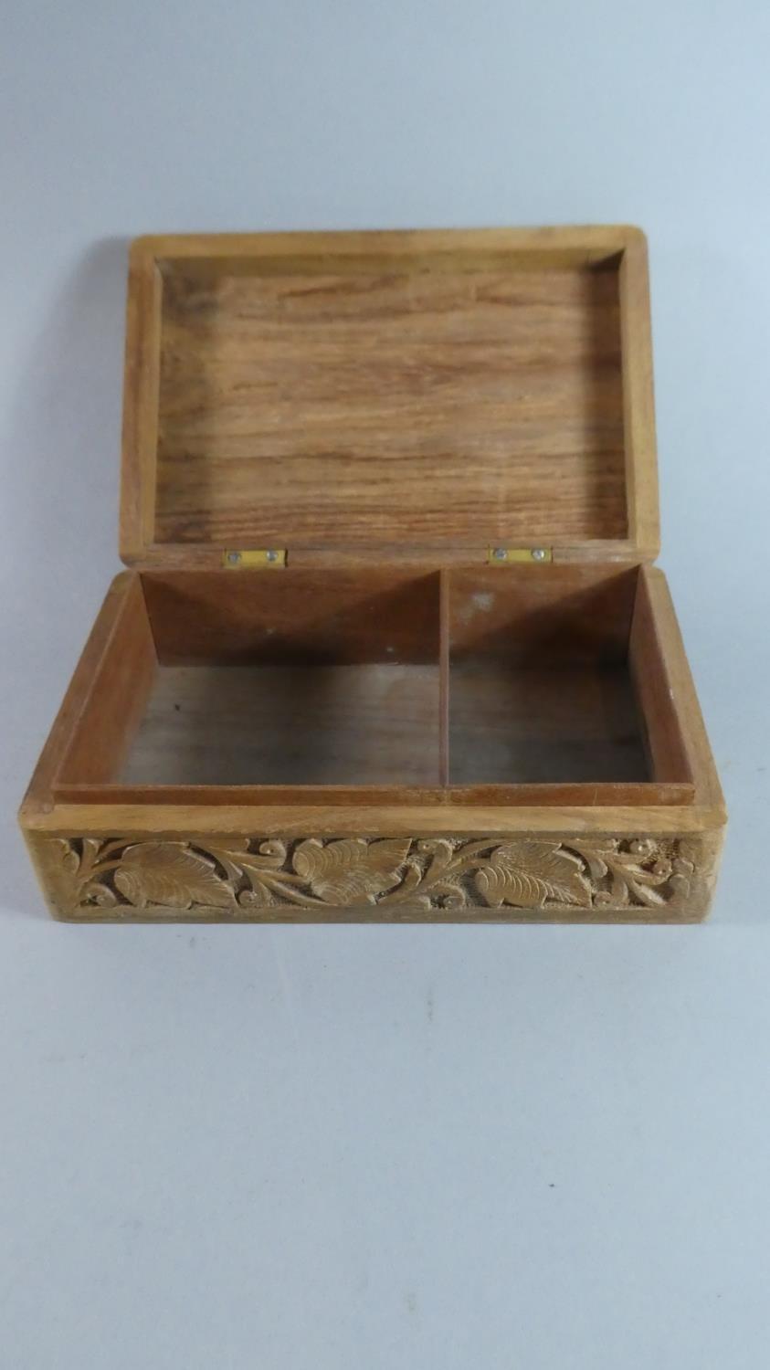 A Carved Wooden Box with Vine Leaf Decoration, 22.5cms Wide - Image 2 of 2