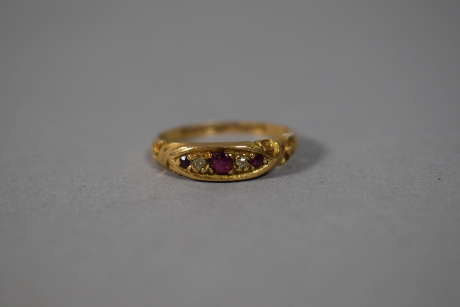 An 18 Carat Gold and Ruby Ring (1902), Size N, 2.5gms