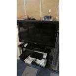 A Sony LCD Digital Colour 36" Television (2009) with Stand Digital Recorder and Pair of CD/DVD