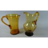 A Whitefriars Amber Glass Jug and One Other, 20cms High