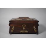 A 19th Century Rosewood and Mother of Pearl Inlaid Sarcophagus Shaped Tea Caddy with Two Division