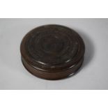 A Circular Wooden Snuff Box with Concentric and Interlocking Ring Decoration, 7.5cms Diameter