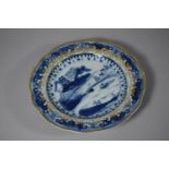 An Early Chinese Blue and White Plate with Gilded Wavy Rim and Gilt Foliate Band, 20.75cms