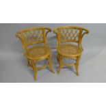 A Pair of Circular Bamboo and Cane Seated High Back Stools