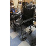 A Folding Wheelchair