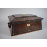 A 19th Century Regency Rosewood Work Box of Sarcophagus Form with Mother of Pearl Disc Inlay