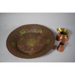 A Copper and Brass Charger, Copper Jug and Miniature Churn