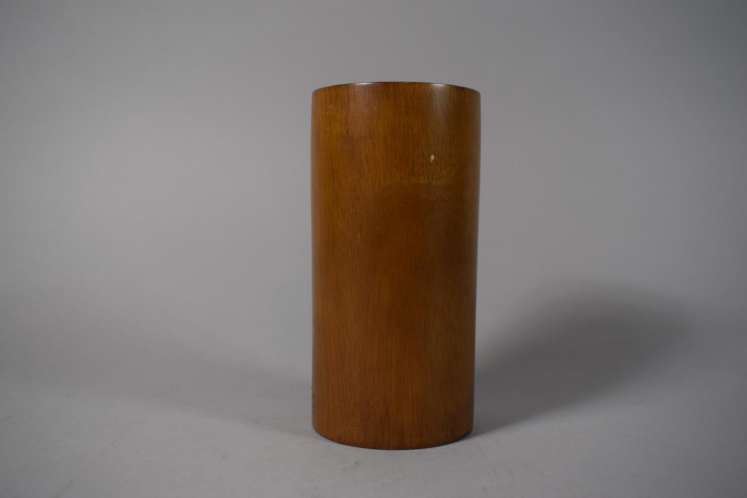 A Chinese Cylindrical Wooden Brush Pot, 15.25cms High