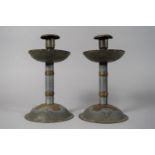 A Pair of Arts and Crafts Copper Mounted Metal Candlesticks with Faux Rivet Decoration, 22cms High