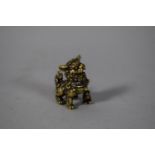 A Small Chinese Bronze Study of a Foo Dog, 3cm High