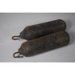 A Pair of Iron Long Case Clock Weights