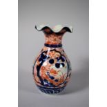 An Oriental Imari Vase with Wavy Rim, 16cms High