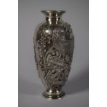 A Good Chinese Silver Vase Stamped for Wang Hing, Decorated in Relief with Birds on Branch, 14cms