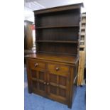 A Mid 20th Century Oak Dresser with Two Drawers Over Cupboard and Raised Three Shelf Rack, 107cms