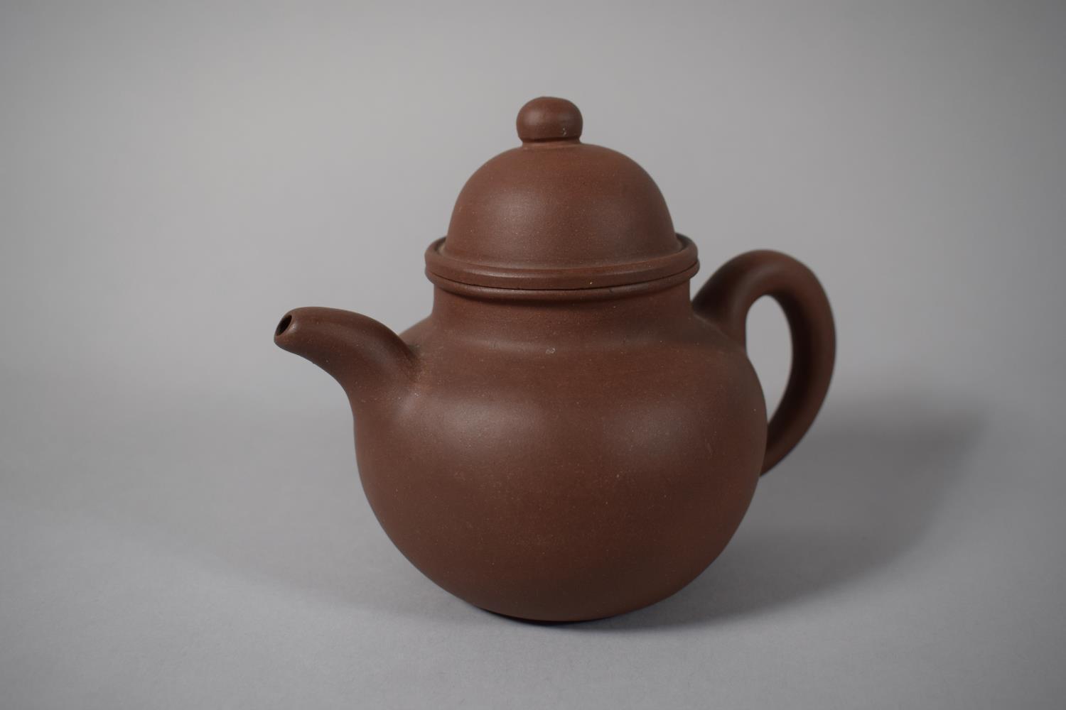 A Yixing Teapot, Signed to Base, 13.5cms High