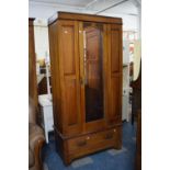 An Edwardian Mirror Fronted Single Wardrobe with Base Drawer, 96cms Wide