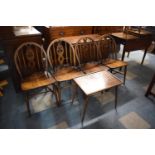 A Set of Four Ercol "Fleur De Lys" Dining Chairs and A Small Coffee Table