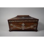 A 19th Century Rosewood and Mother of Pearl Sarcophagus Shaped Workbox with Ring Carrying Handles on