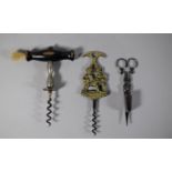 A Vintage Ebonised Handled Corkscrew with Brush, a Brass Pixie Corkscrew and a Candle Snuffer