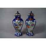 A Pair of Late 19th Century Oriental Hexagonal Lidded Vases, Decorated with Flowers, 25cms High