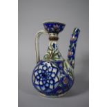 A Chinese Stoneware Wine Ewer with Floral Decoration in Cobalt Blue, Green and Red Enamels, Spout