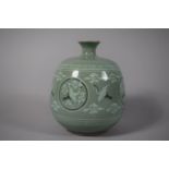 A Korean Celadon Crackle Glazed Vase Decorated with Cranes and Clouds, 15cms High