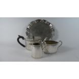 A Silver Plated Reeded Tea Set Comprising Teapot, Milk & Sugar - The Teapot with Pineapple Finial