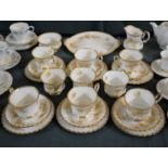 A Collection of Royal Albert Antoinette Teawares, Six Trios, Sugar Bowl (AF), Cake Plate, Jug &